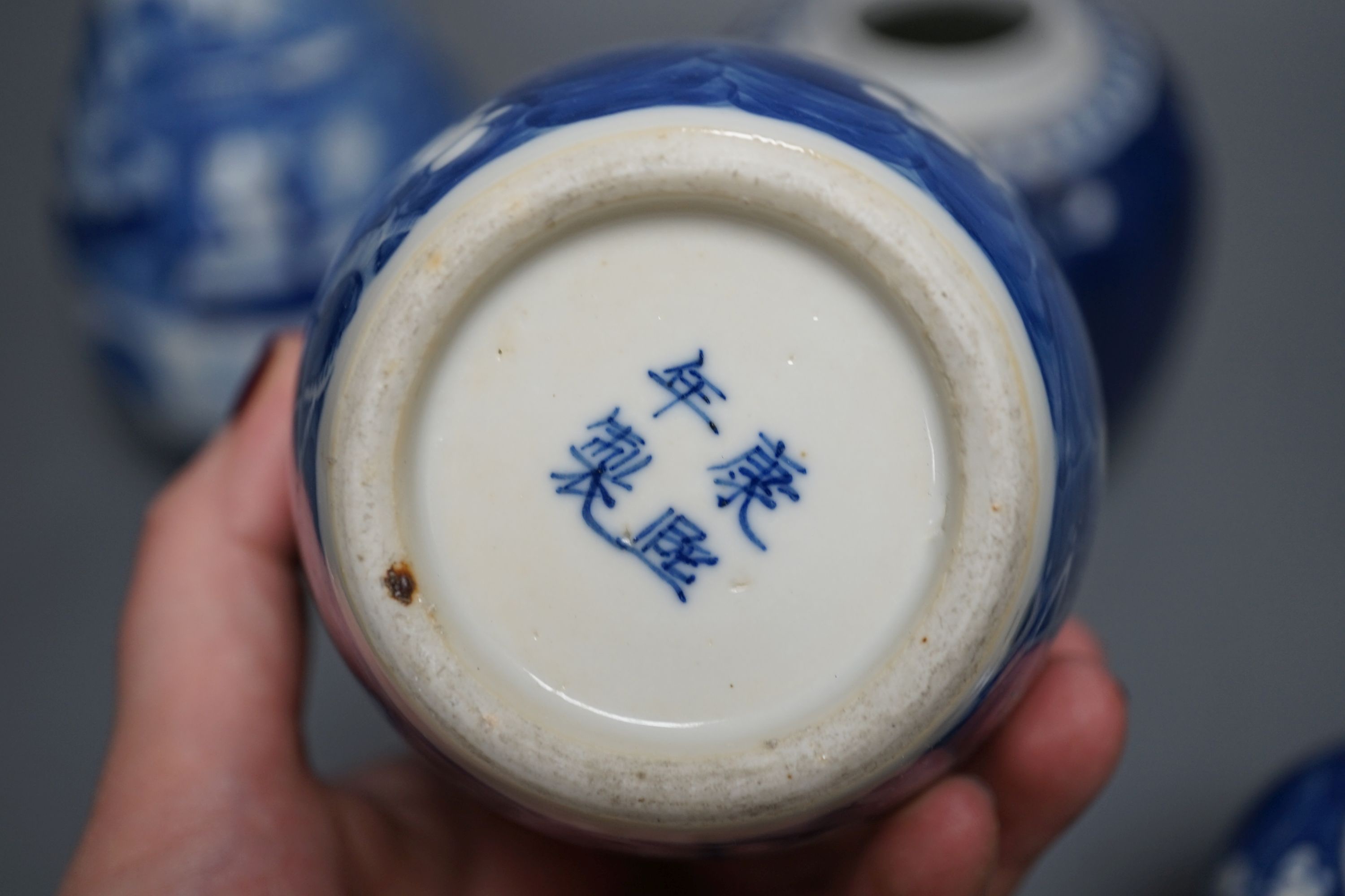 A Chinese blue and white vase and 3 graduated blue and white ginger jars, Vase25 cms high.